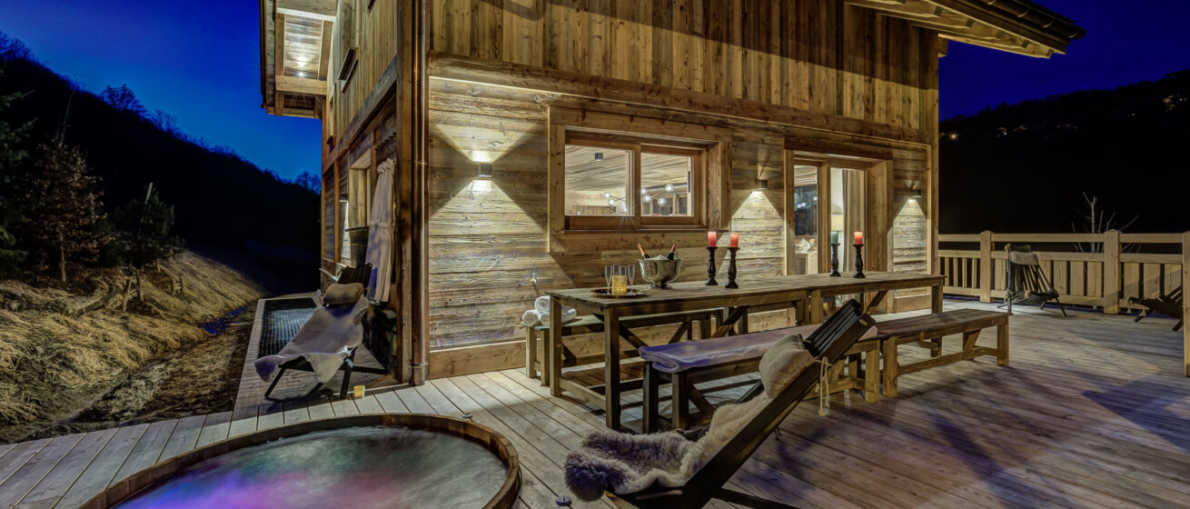Chalet Bergeronnette, Meribel - chalet exterior with large terrace and outdoor hot tub